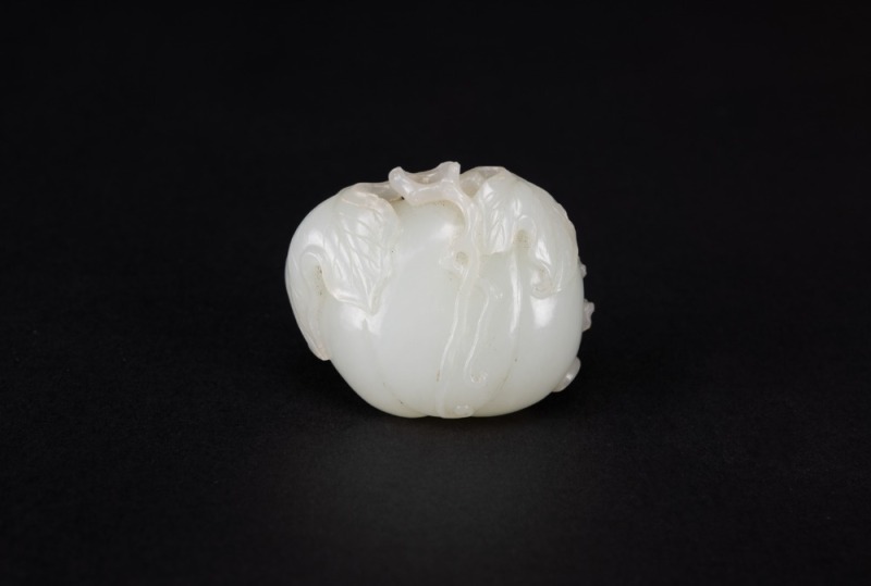 A White Jade Carved &lsquo; Flying Bat Pumpkin Pendant.
