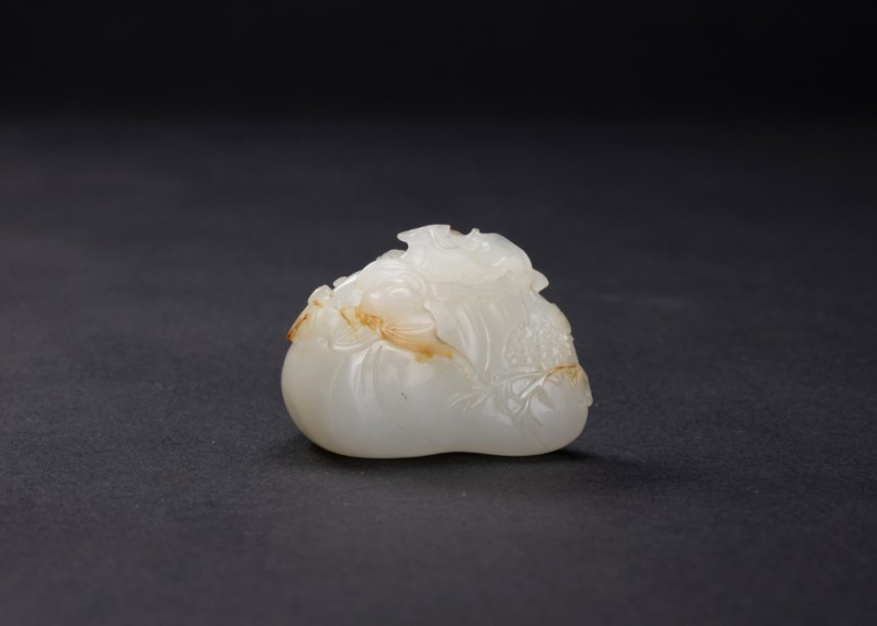 A Russet White Jade Carved &lsquo;Treasure Bag And Bat&rsquo; Pendant