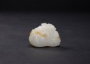 A Russet White Jade Carved &lsquo;Treasure Bag And Bat&rsquo; Pendant