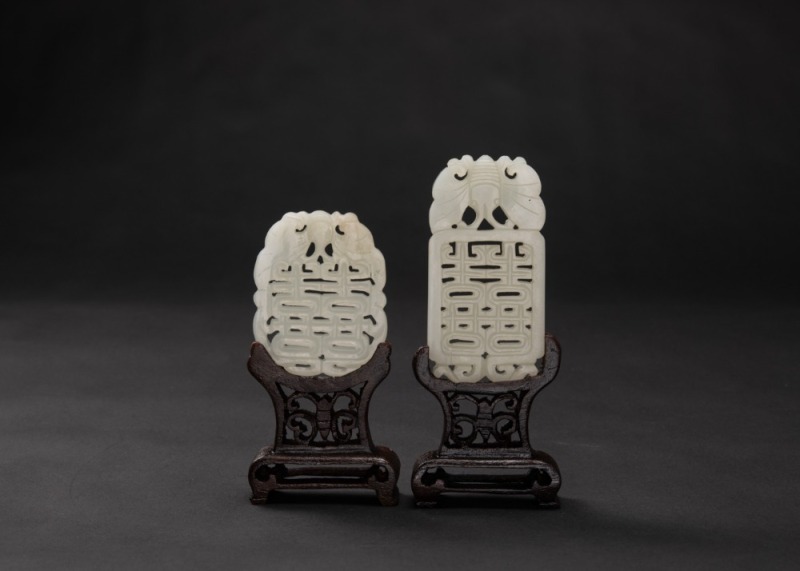 A Group Of Two White Jade Carved &lsquo;Happiness&rsquo; Pendants