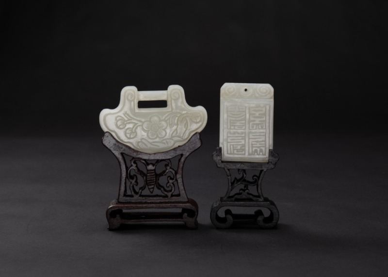A Group Of Two White Jade Carved &lsquo; Figures and Longevity&rsquo; Pendants