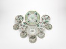 A Group Of Eleven Famille Glaze &lsquo;Peaches And Flowers&rsquo; Dishes