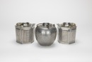 A Group Of Three Tin Win Warm Pot.