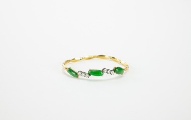 A Three Oval Shape Jadeite Mounted In Gold And Diamond Bracelet.