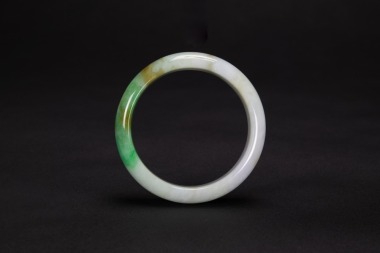A Natural Green And Yellow Jadeite Bangle