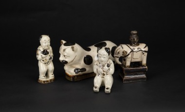 A Group Of Four Cizhou Kiln &lsquo; Two Childs Status,