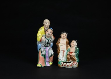A Group Of Two Famille Glazed &lsquo;Immortals Of Harmony&rsquo; Statues