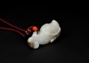 A White Jade Carved &lsquo;Carp with Lotus&rsquo; Pendant. LateQing/Republic - 2