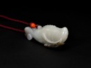 A White Jade Carved &lsquo;Carp with Lotus&rsquo; Pendant. LateQing/Republic - 3